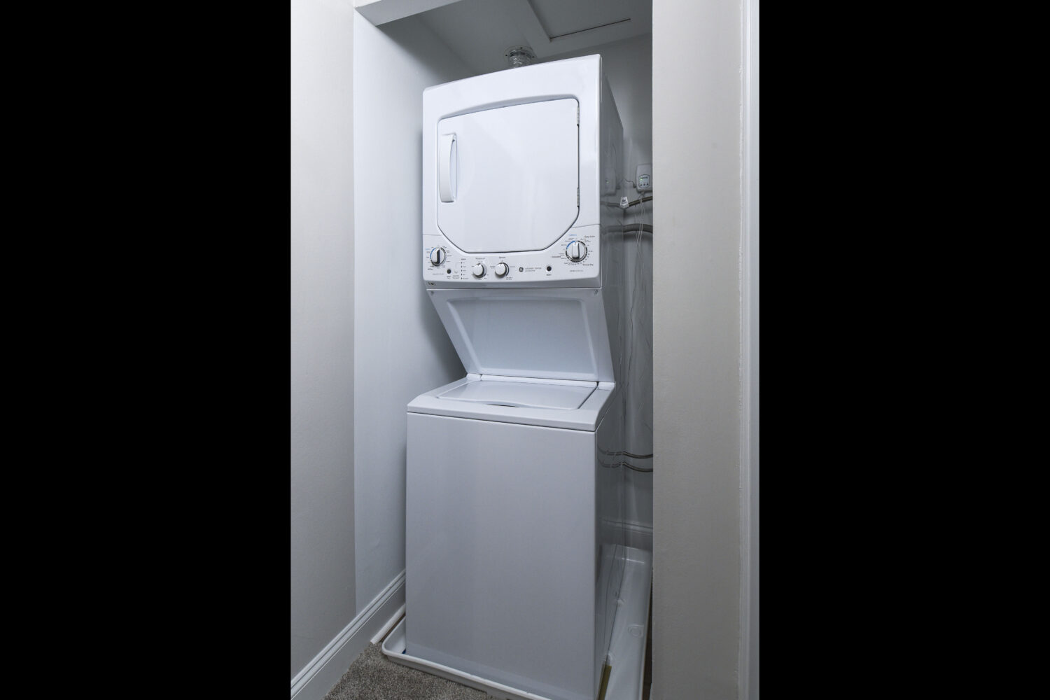 stacked washer and dryer in select apartments
