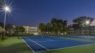 tennis courts lit up at night
