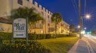 set point sign and front of building at night