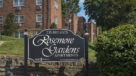 rosemore garden sign infront of stone wall 