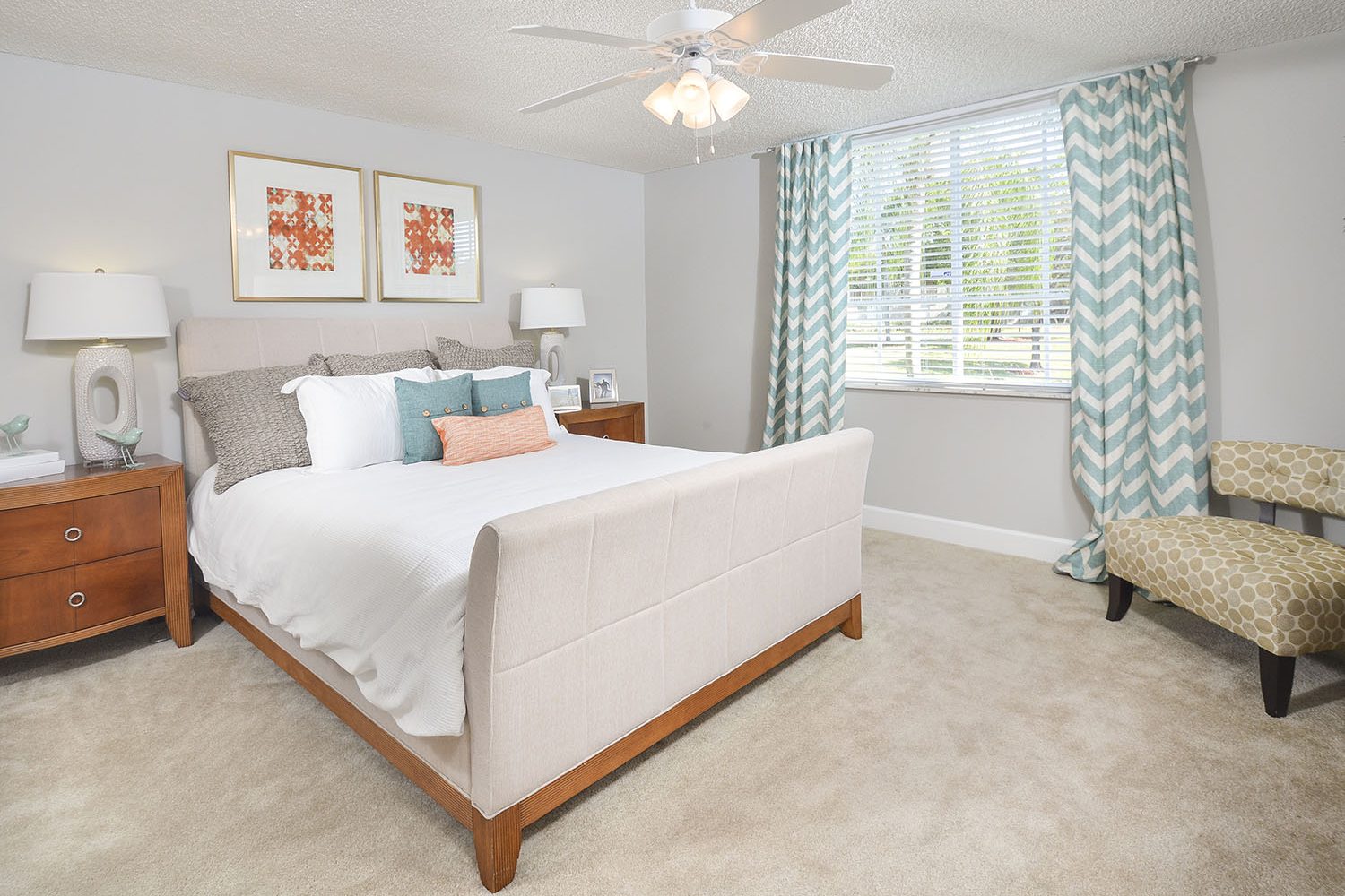 large bedroom with wall to wall carpet 