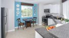 eat in kitchen with white cabinets 