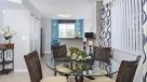 dining room open to the kitchen with tile flooring 