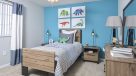2nd bedroom with carpeting and ceiling fan 