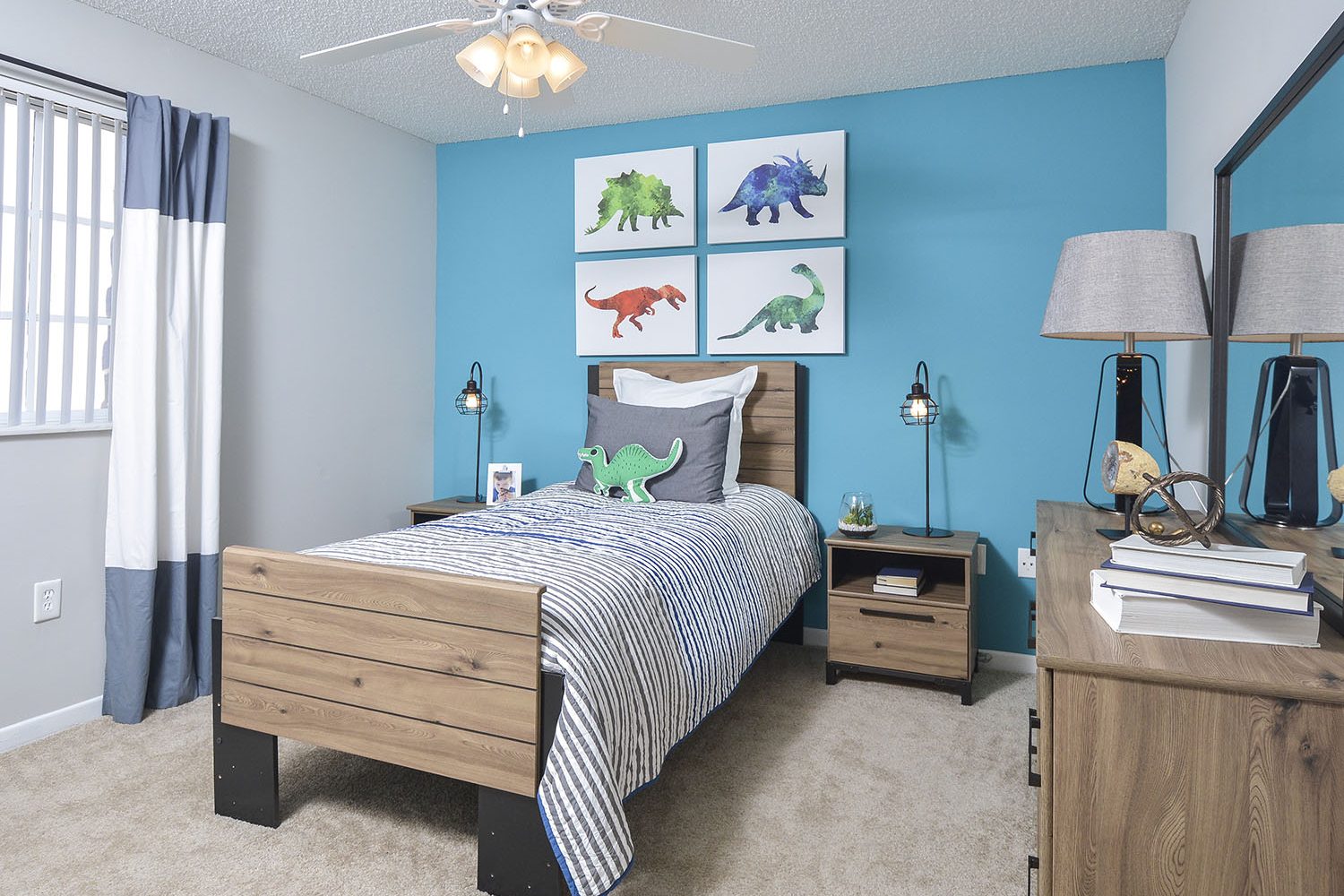 2nd bedroom with carpeting and ceiling fan 