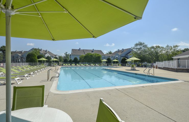 pool with umbrella tables 