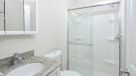 bathroom with white vanity and mirror