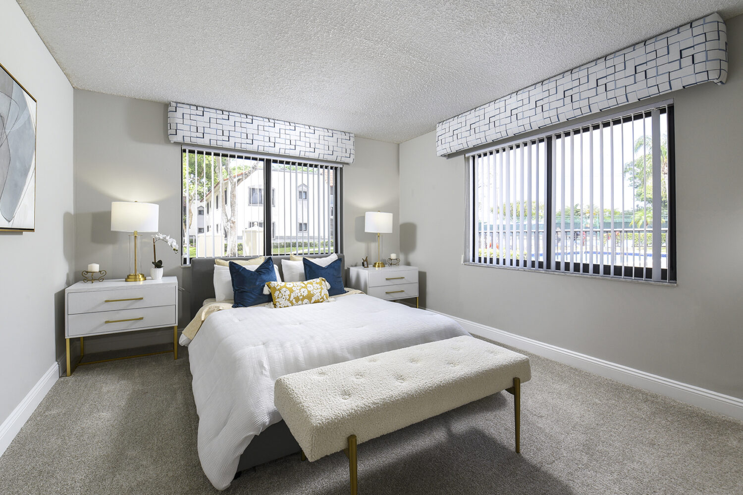 large bedroom with wall to wall carpet