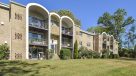 exterior facade with balconies and green grass 