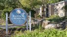round blue radnor crossing sign at entrance of community 