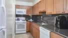 standard kitchen with white appliances 