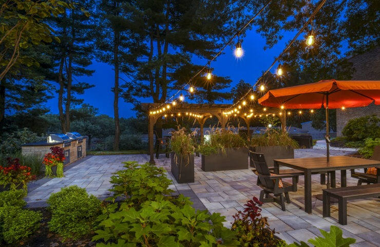 Outdoor Lounge Area at night with string lights