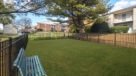 Fully fenced dog park with bench