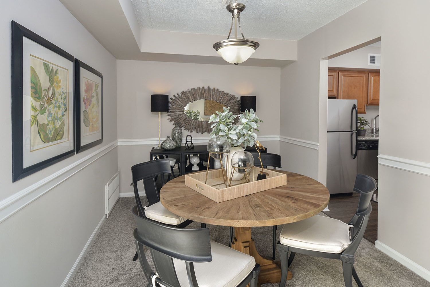 dining room outside of kitchen with table and 4 chairs
