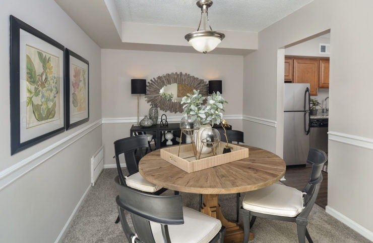 dining room outside of kitchen with table and 4 chairs
