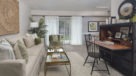 large living room with sliding door to patio