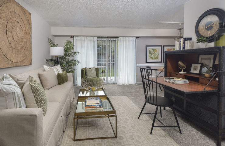 large living room with sliding door to patio