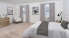 large bedroom with carpeting 