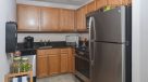 kitchen with stainless steel appliances and oak cabinets 