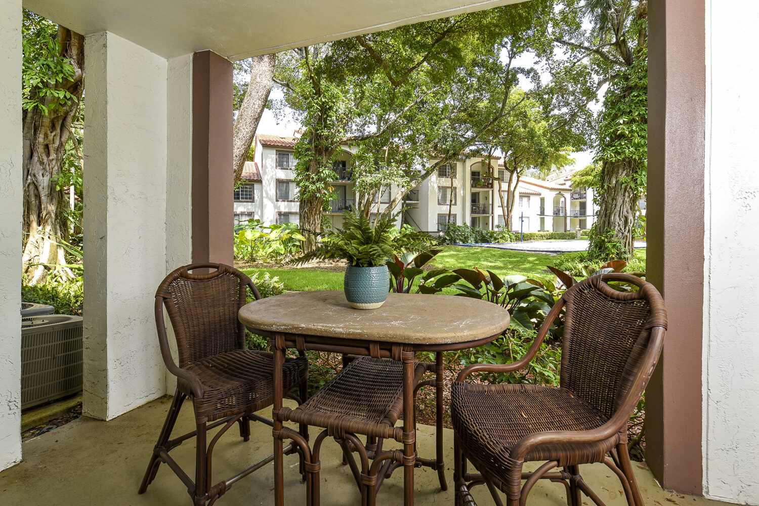 outdoor patio with table and chairs 