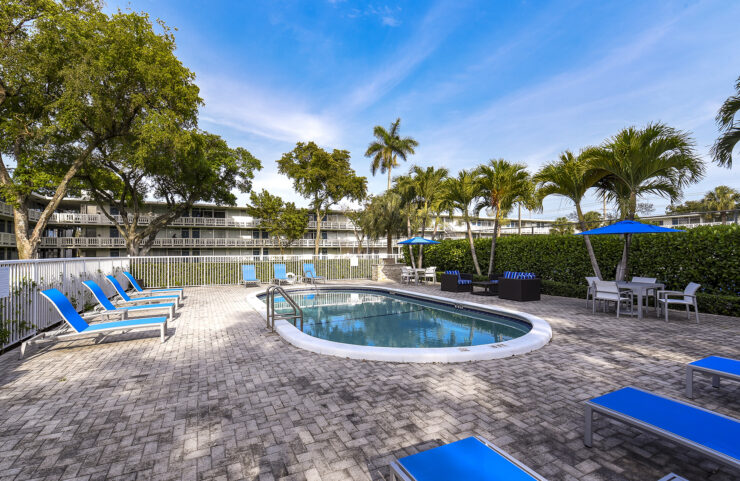 Outdoor pool with patio furniture