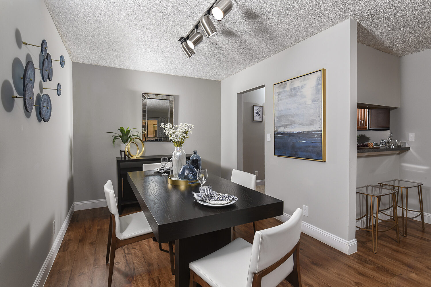 dining area with plank flooring