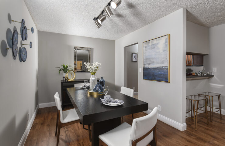 dining area with plank flooring