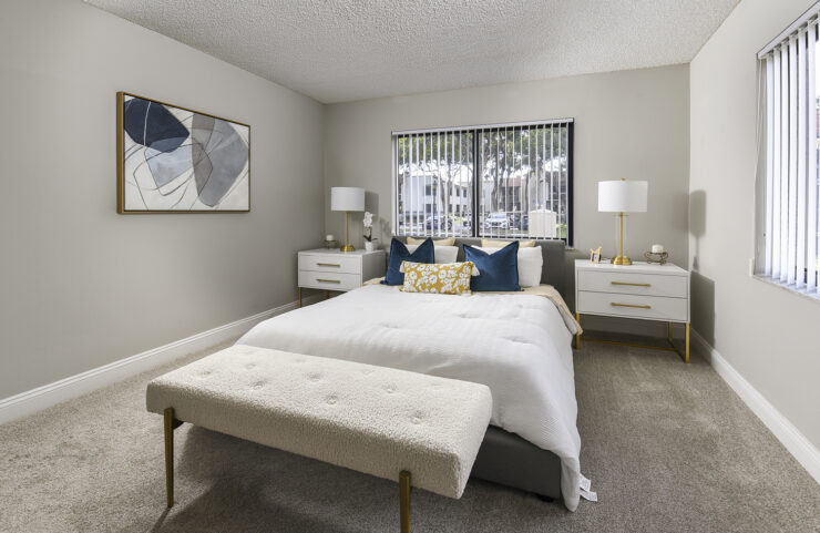 large bedroom with wall to wall carpet