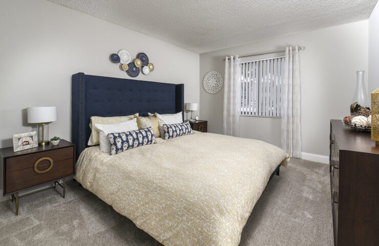 large bedroom with wall to wall carpet in boca raton