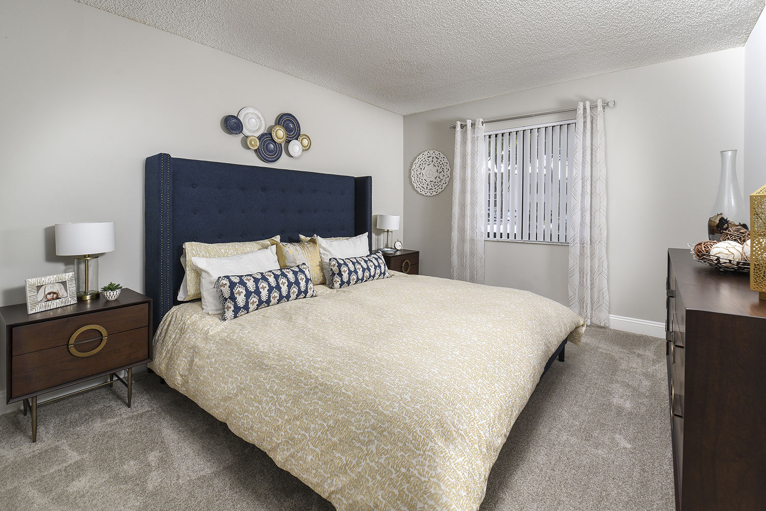 large bedroom with wall to wall carpet in boca raton