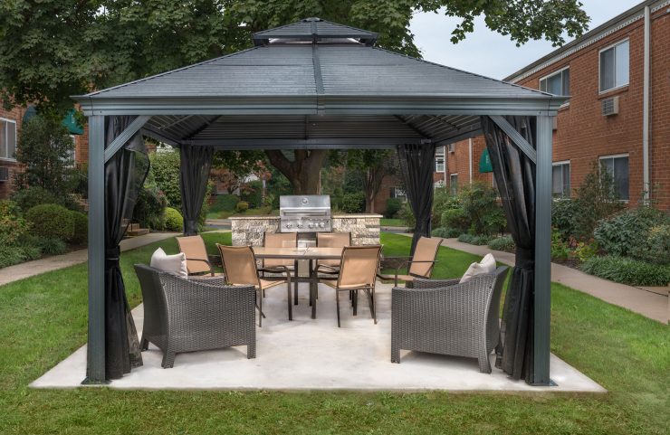 black canopy covering outdoor kitchen 