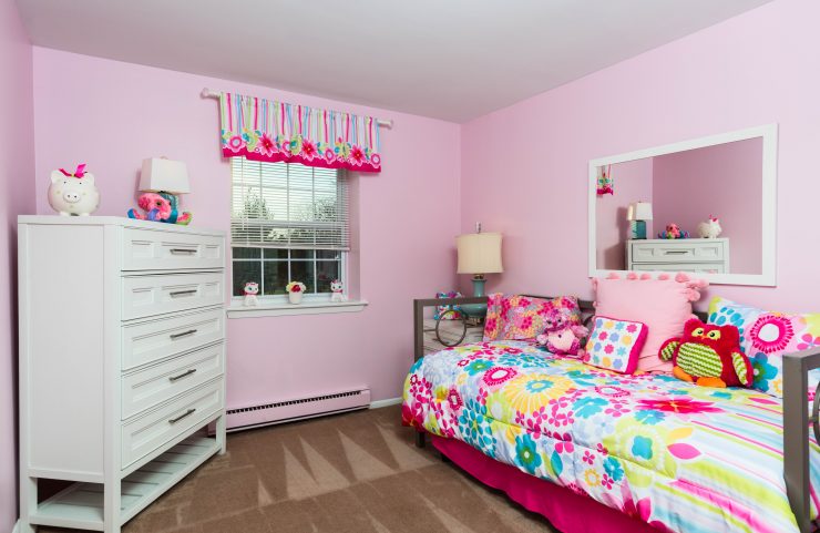 secondary bedroom with wall to wall carpet