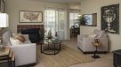 living room with wall to wall capeting and fireplace