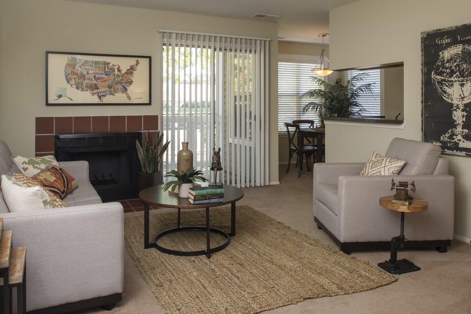 living room with wall to wall capeting and fireplace