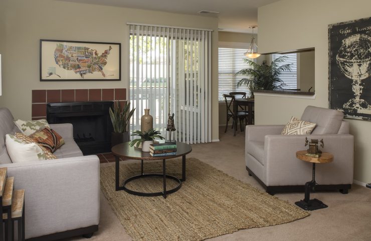 living room with wall to wall capeting and fireplace