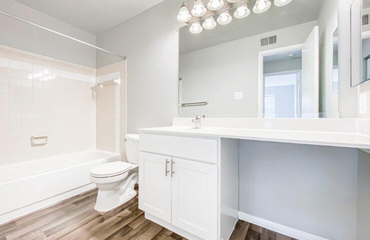 updated bathroom with white vanity