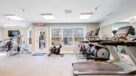 fitness center with cardio equipment