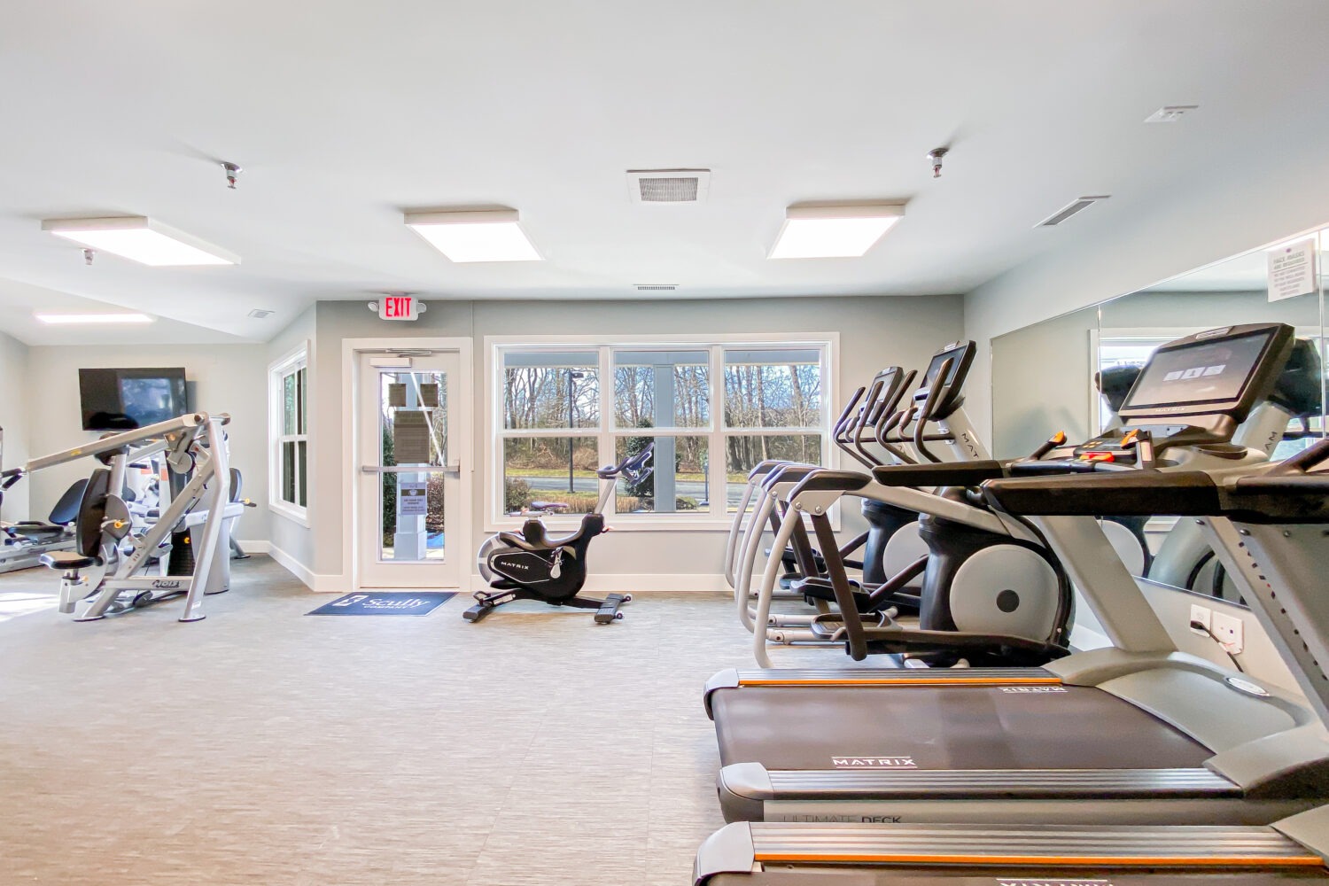 fitness center with cardio equipment