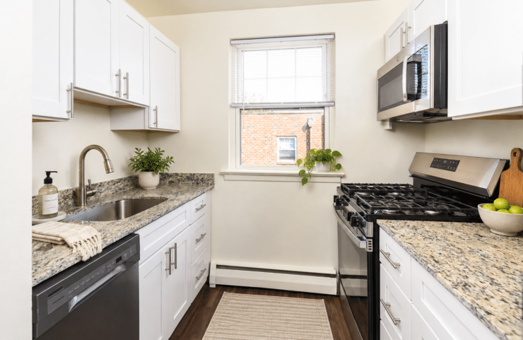 galley style kitchen with large window 