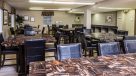tables and chairs in the community center 