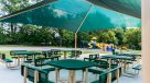 covered picnic area with benches and tables