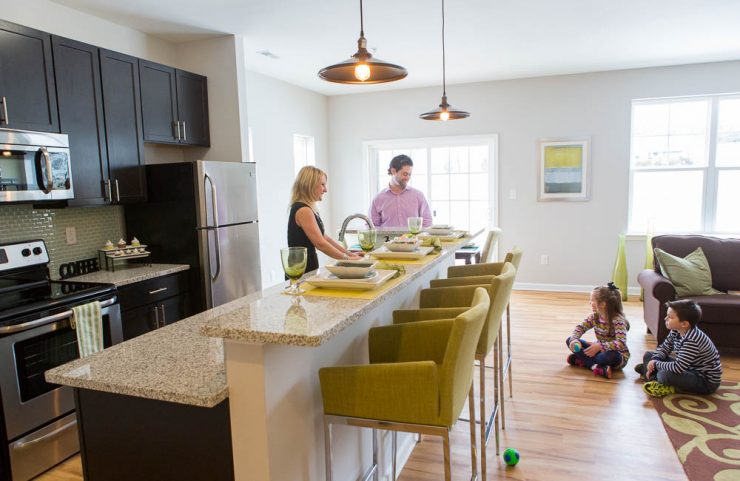 open floorplan kitchen with large island to sit four 