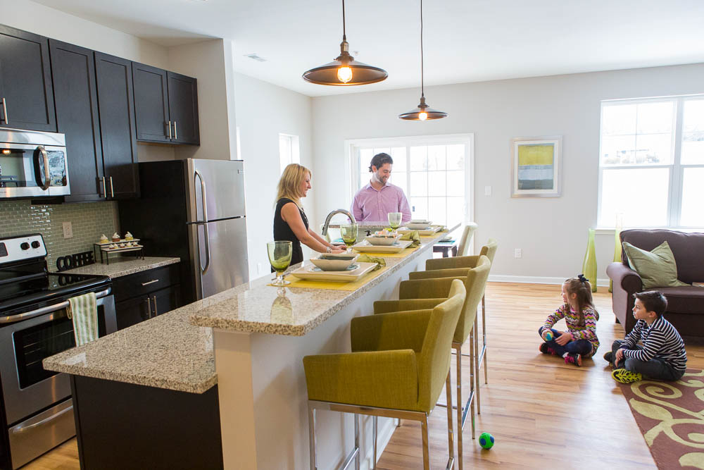 open floorplan kitchen with large island to sit four 