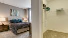 carpeted bedrooms with large walk-in closets
