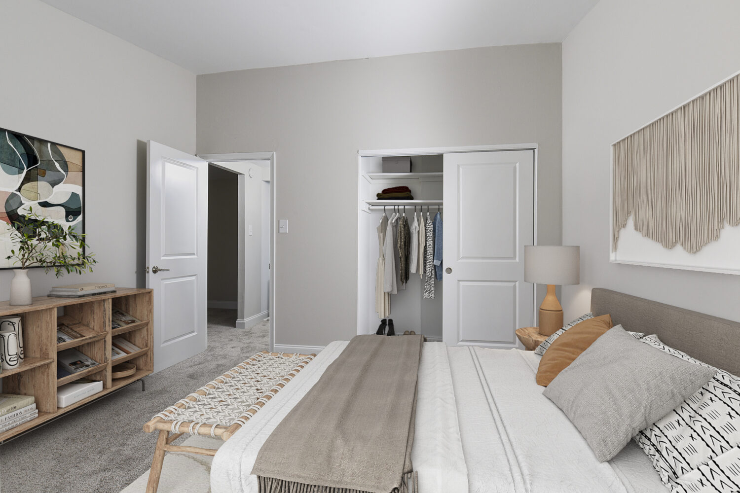 bedroom with wall-to-wall carpet and large closet