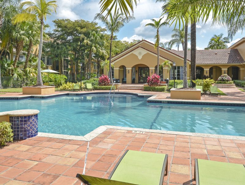 Mediterranean-style swimming pool with sundeck