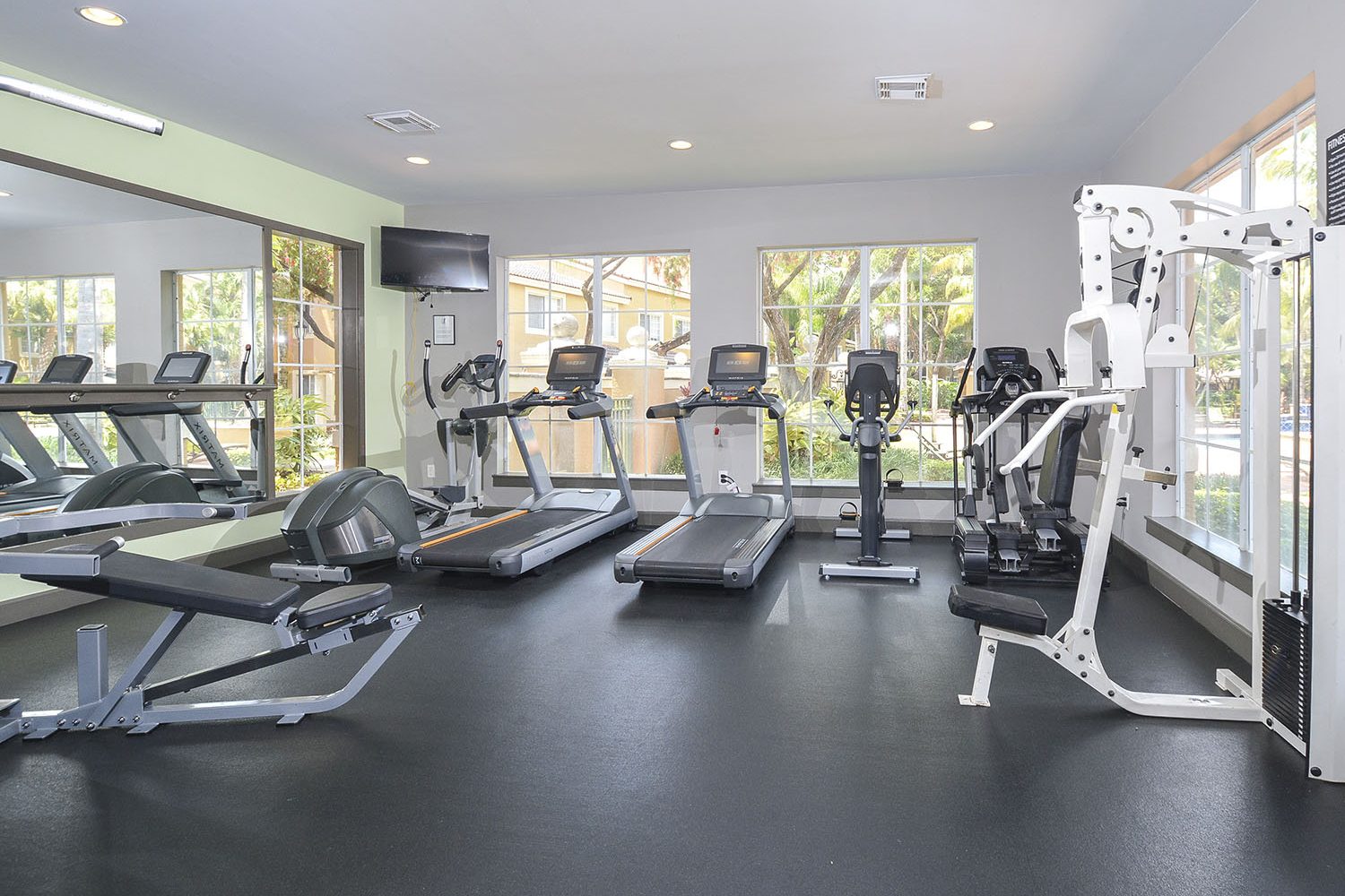 large fitness center with windows for a nice view