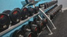 closeup of free weights in fitness center