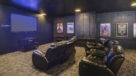 24 hour theater room with recliners 