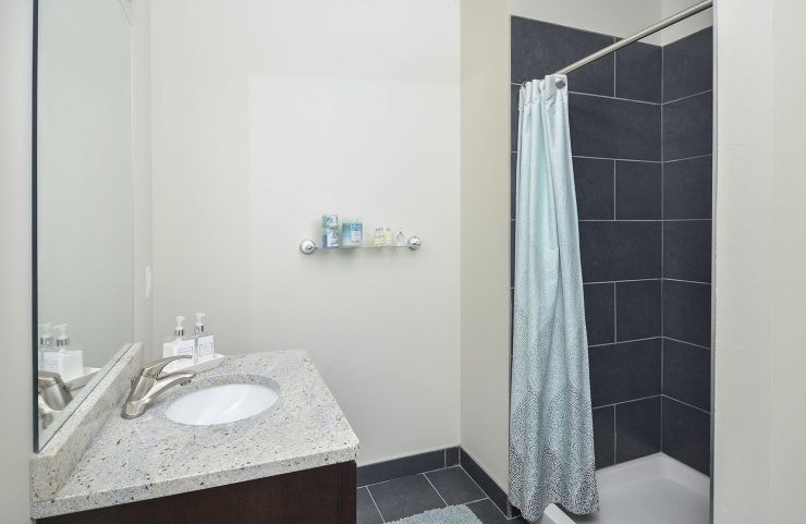 bathroom with modern vanity 
